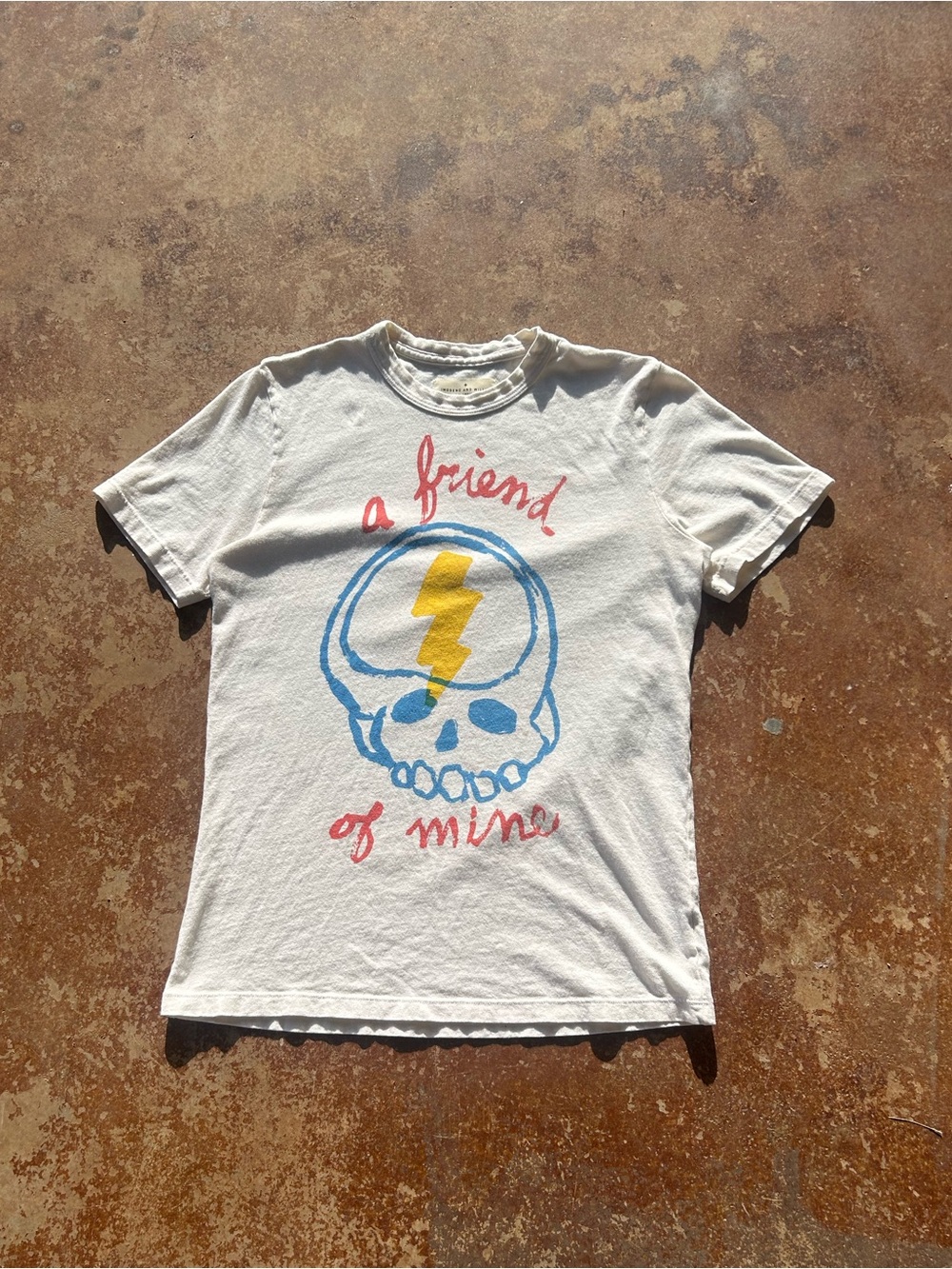 Imogen + Willie “ A friend of mine” Cream tee w skull and lightning design XS